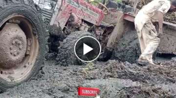 Massey Ferguson tractor stuck in mud and pulling|tractor video|How to remove tractor from mud.